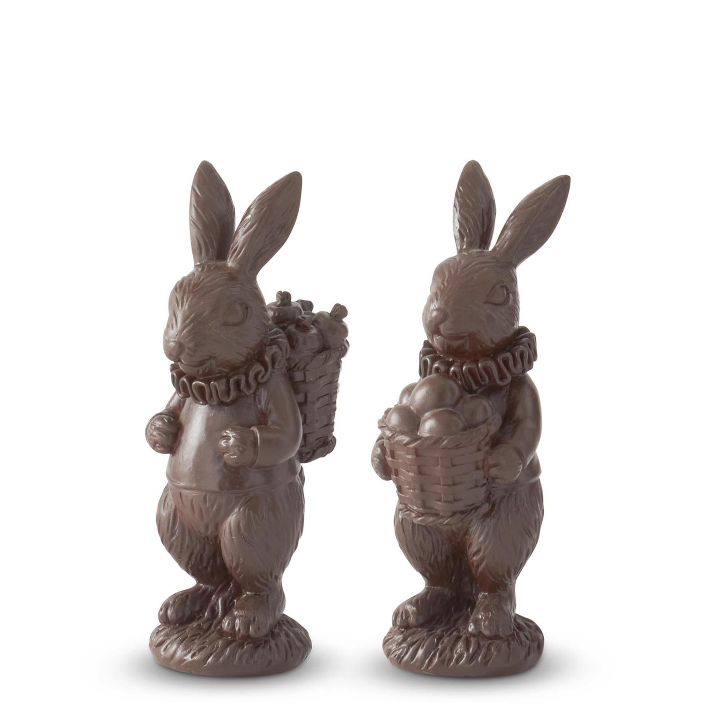 2 bunny figurines that look like chocolate candy bunnies carrying baskets 
