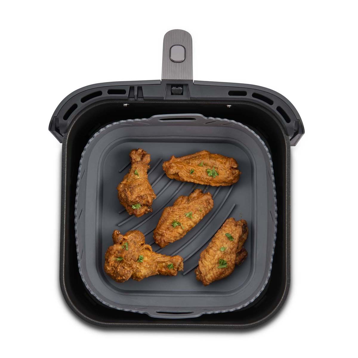 top view of square Silicone Air Fryer Liner with food in it