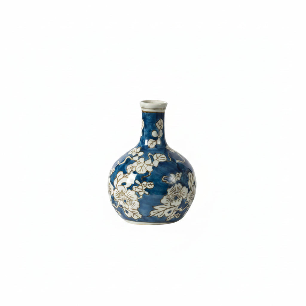 blue and white long neck vase on a white background