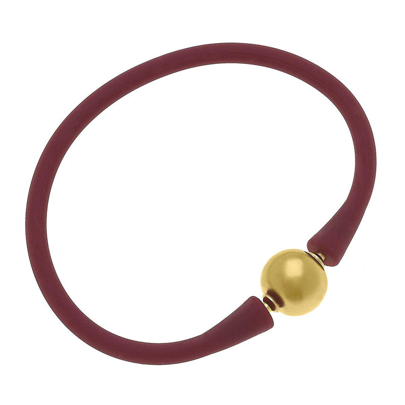 burgundy Bali 24K Gold Plated Bead Silicone Bracelet on a white background.