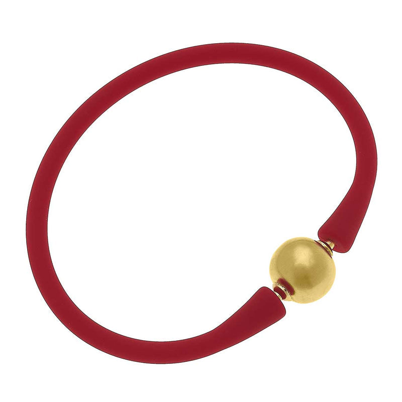 red Bali 24K Gold Plated Bead Silicone Bracelet on a white background.