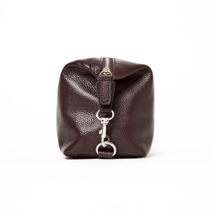 side view of the stanford toiletry bag in brown