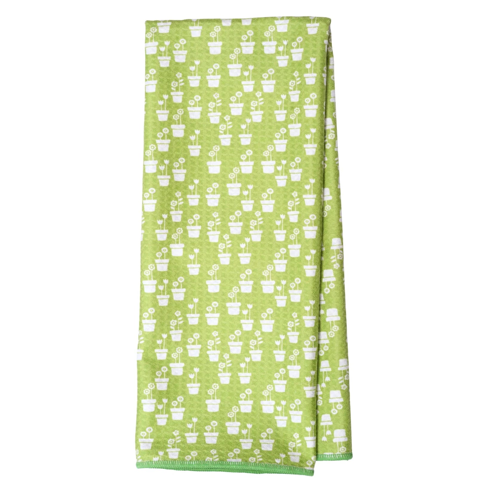 reverse side of Twilight Cottages that is green with potted plant design printed on it