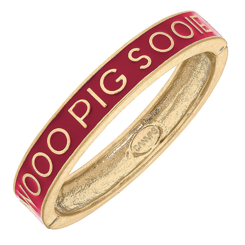 gold bange with red enamel and "woo pig sooie" in gold all around the gold.