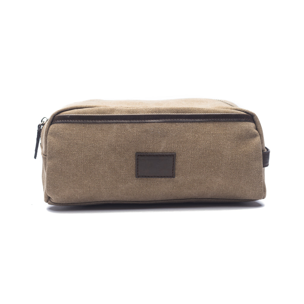 front view of khaki canvas zipper bag with vegan leather accents.