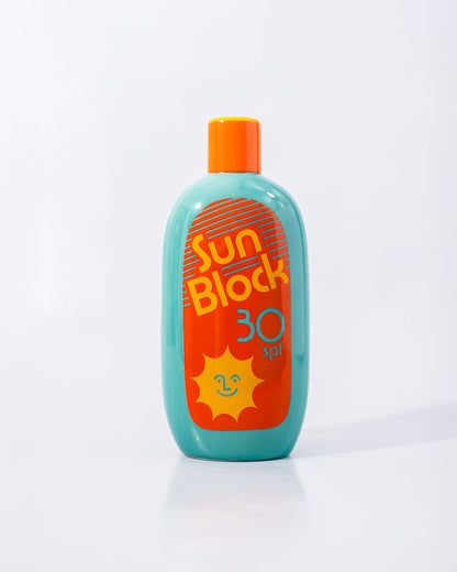 teal bottle shaped vase with orange design and "sun block 30spf" and graphic of a smiling sun