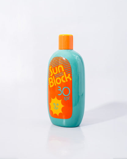 side view of sun block bottle vase