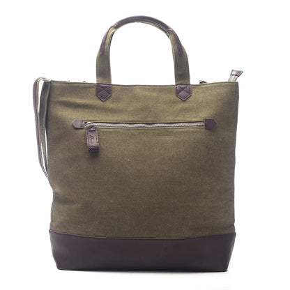 front view of green canvas tote with vegan leather accents.