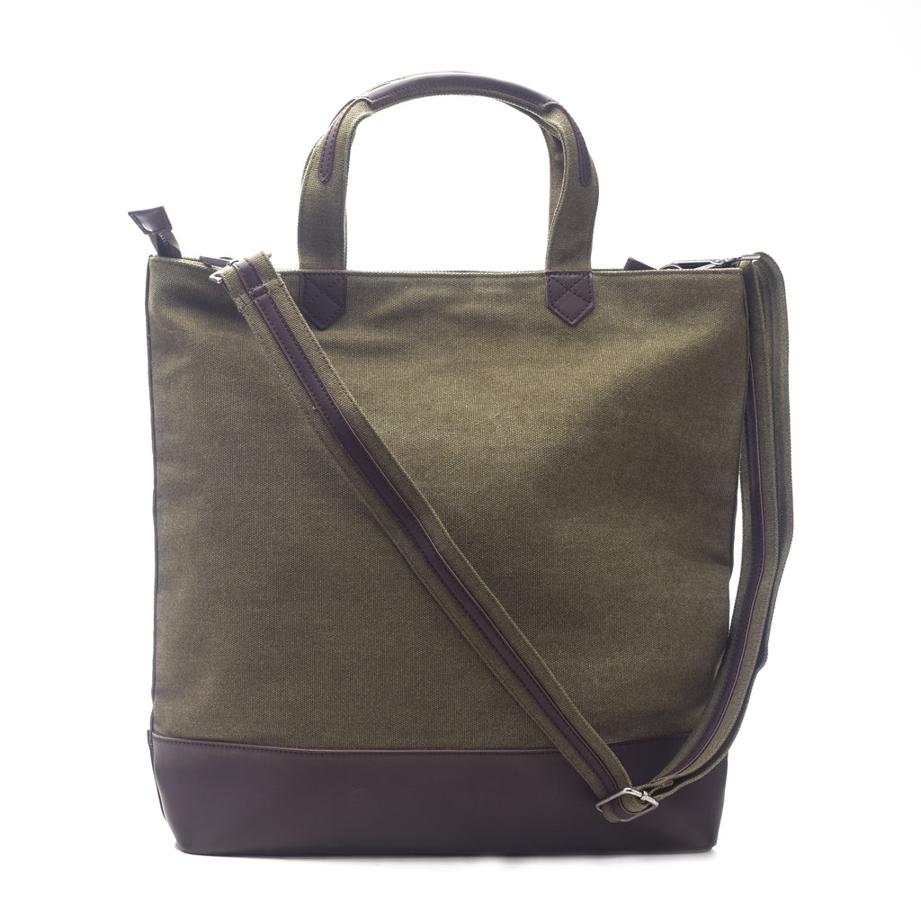 back view of green canvas tote with vegan leather accents.
