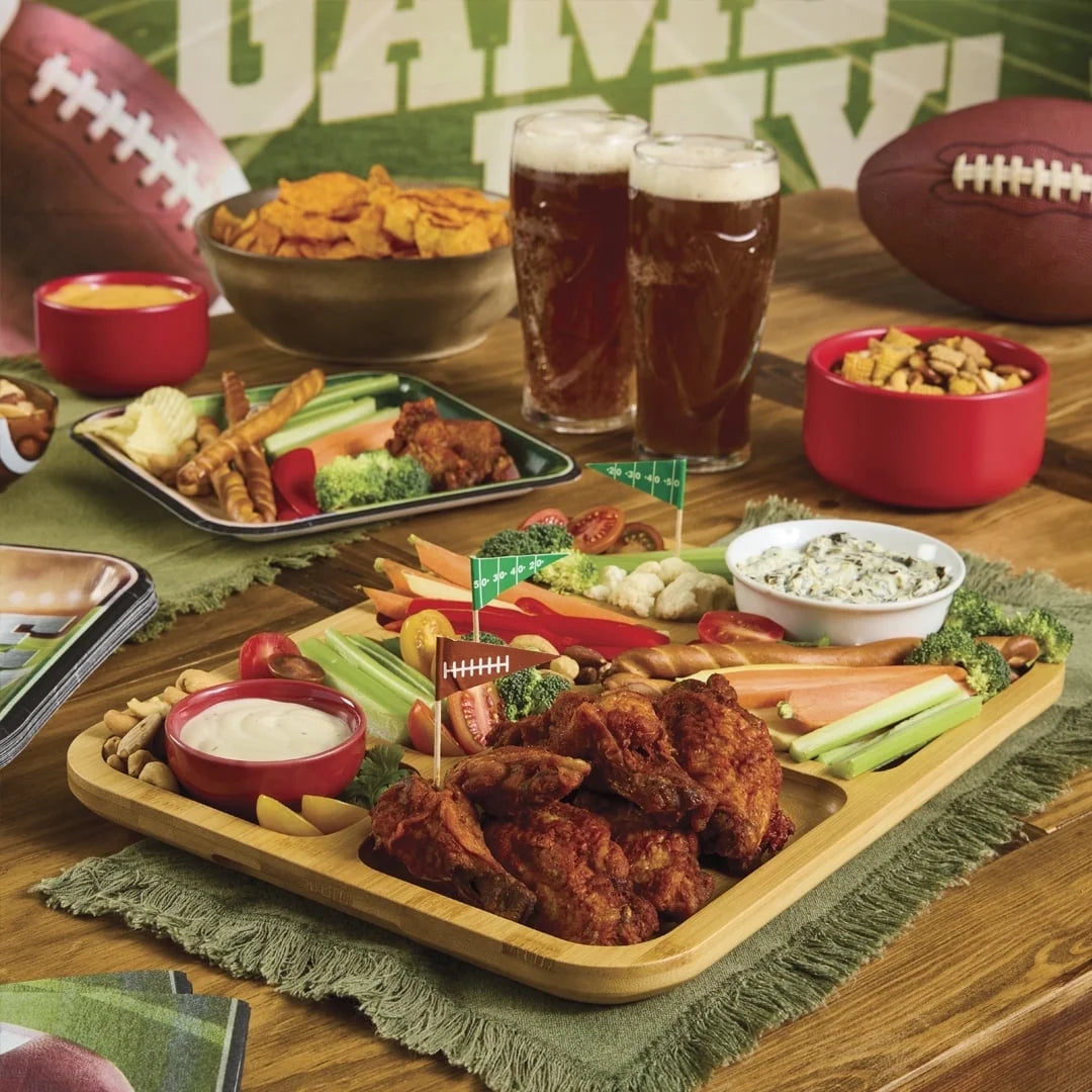 6 Section Build A Board filled with snacks on a table with a game day theme