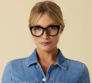 person wearing center stage black frames