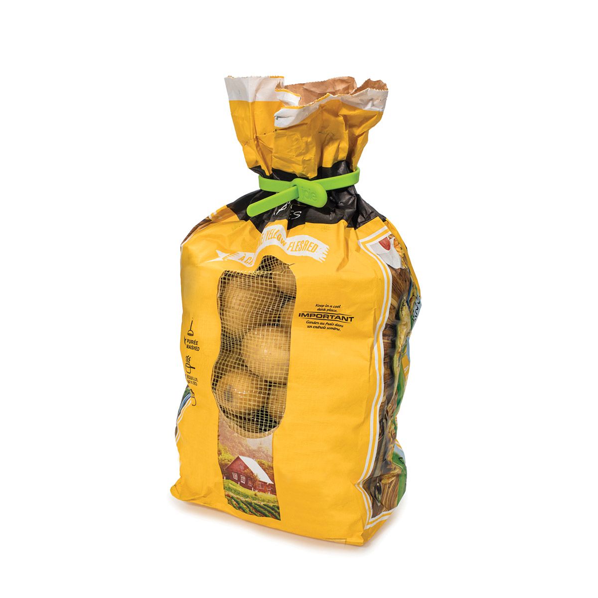 Yellow potato bag with green tie on a white background