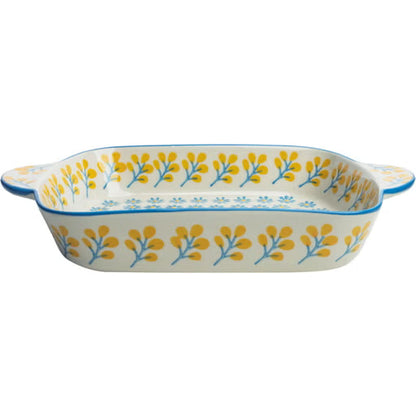 Rectangular ceramic baking dish with yellow and blue floral pattern on a white background