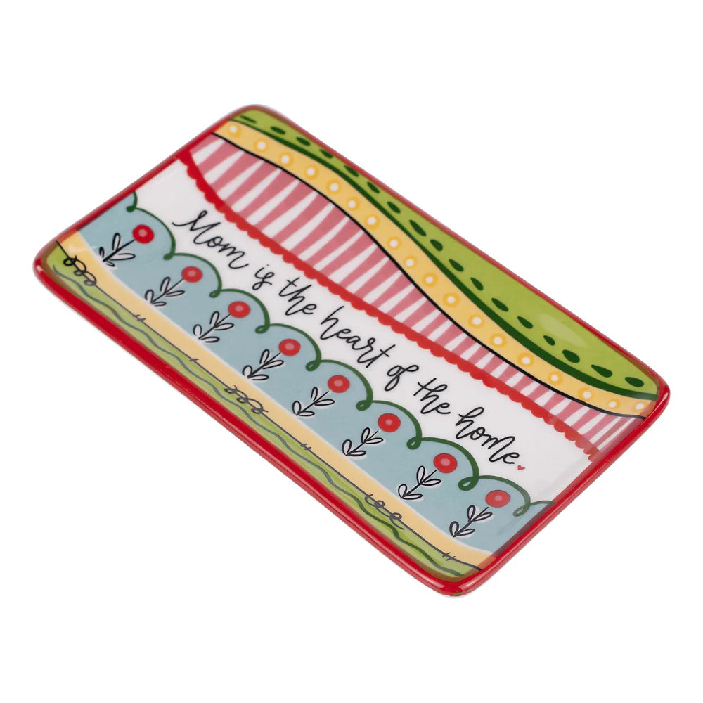 angled view of Decorative tray with colorful design and text on a white background