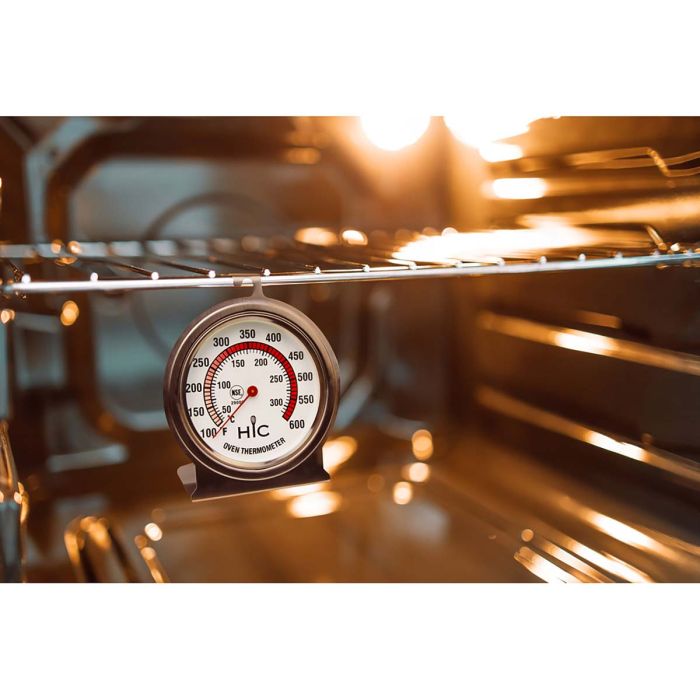 Large Face Oven Thermometer hanging on rack in oven