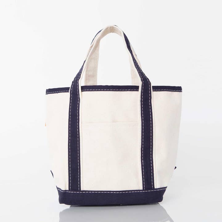 off white tote with navy handles and trim
