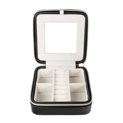 black travel jewelry box open showing bottom section and built-in mirror.