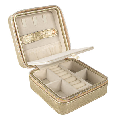 gold travel jewelry box open showing two layers with slots and compartments of various sizes.