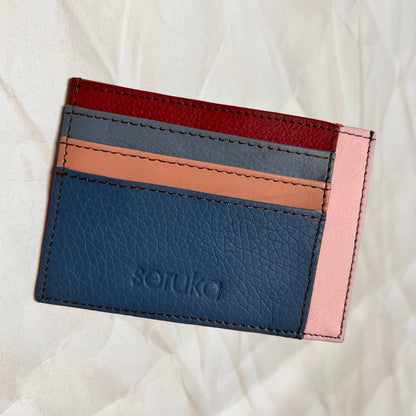 blue polly wallet with colorful card slots.