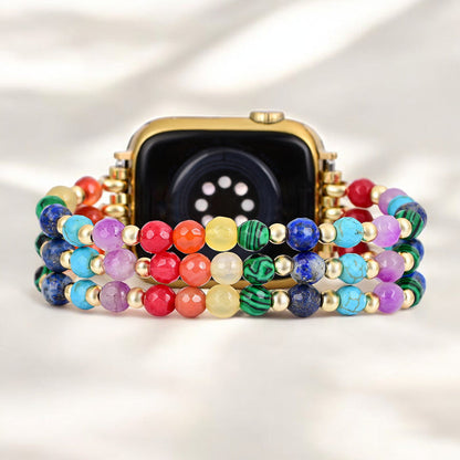 back view of Smartwatch with a rainbow gemstone beaded band on a light background