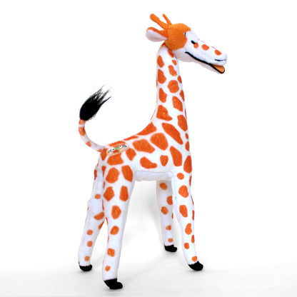 side view of plush giraffe toy standing on a white background.