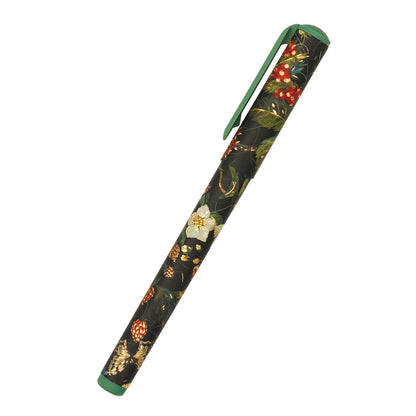 black writing pen with berry and florald design printed on it