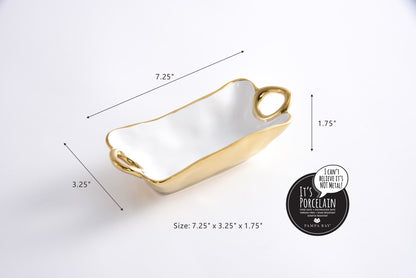 White dish with gold rim and handles, shown with measurements on a white background