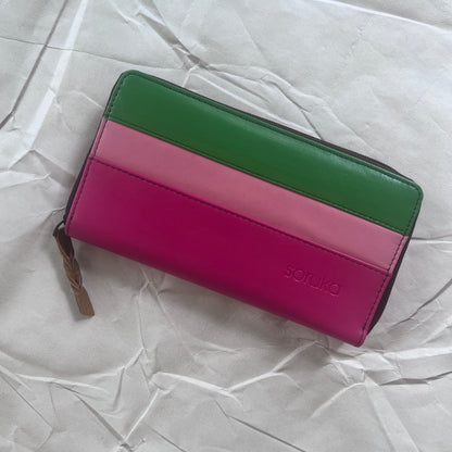 front view of pink carla wallet with pink and green stripes