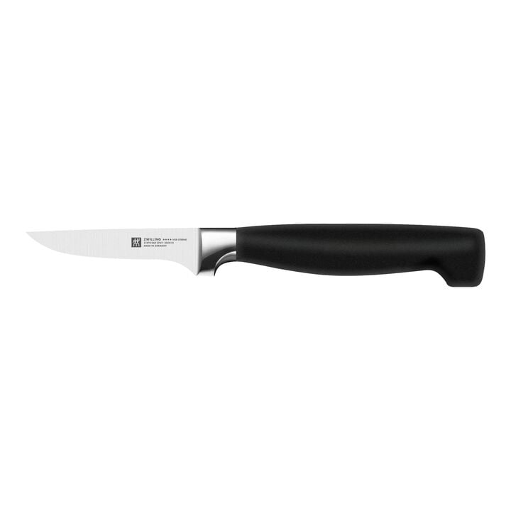 short blade paring knife with black handle on white back ground