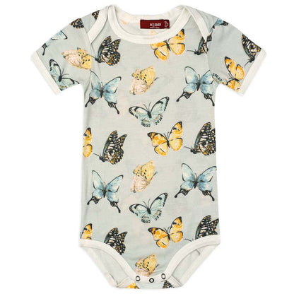 light blue onsie with all-over butterfly design.