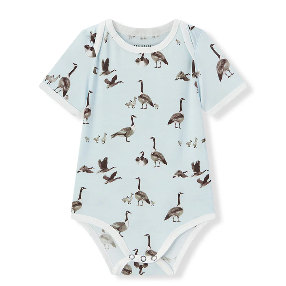 light blue one piece with all-over goose design