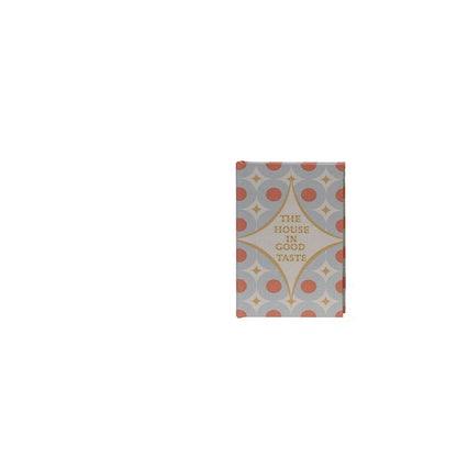 A rectangular book box with a light gray patterned cover featuring coral-red circles, gold geometric lines, and the text 'THE HOUSE IN GOOD TASTE' in gold, shown against a plain white background.