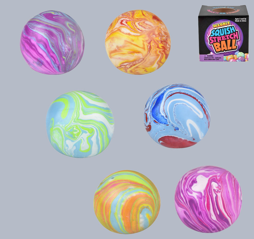 Colorful squishy balls with packaging on a gray background