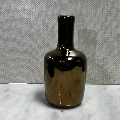 tall bronze vase with slim neck.