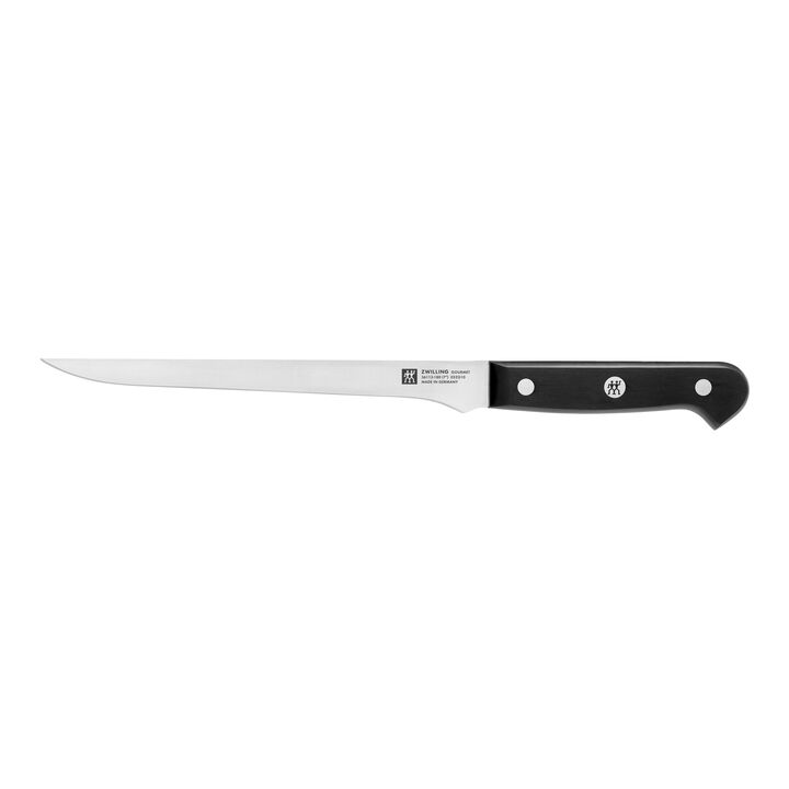 fillet knife with riveted black handle on white background