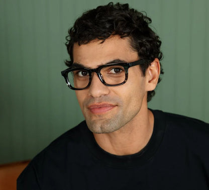 person wearing Otto glasses in color teal ombre horn