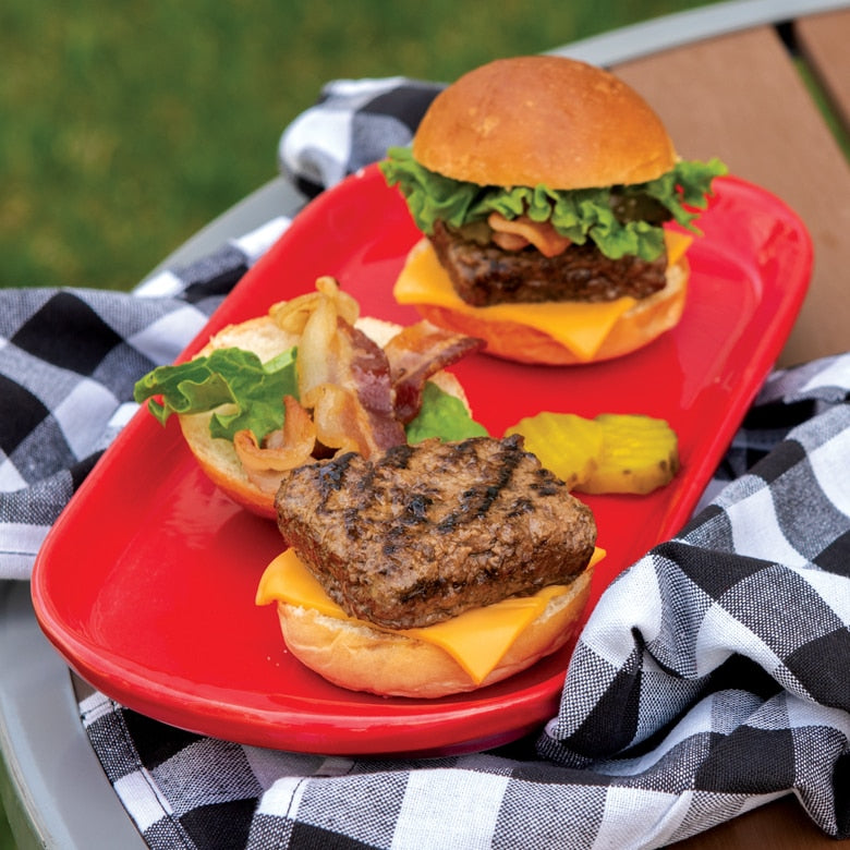 square patty sliders on a plate on a table