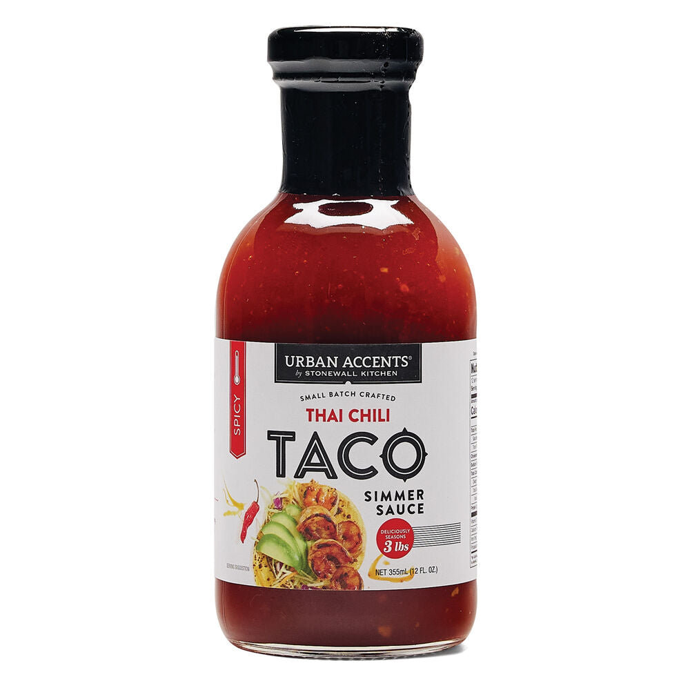 bottle of Thai Chili Taco Simmer Sauce on a white backgorund.