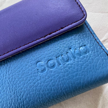 close-up of periwinkle rings wallet