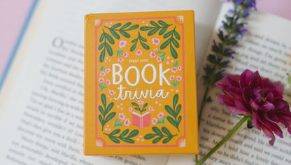box of Book Trivia Card Set laying on an open book