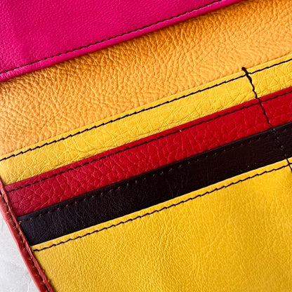 close-up of secret clutch colorful card slots.