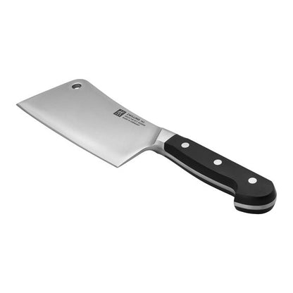 cleaver showing side view of knife with visible full tang on white background