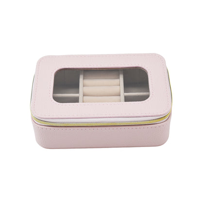 clear top Leah Travel Jewelry Case in pale pink zipped closed