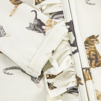 close-up of cuff and ruffles on cat romper