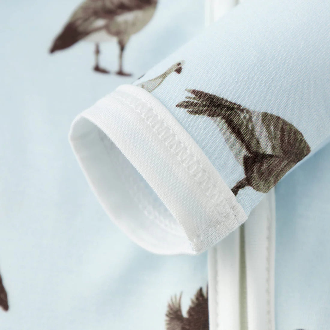 close-up of cuff on goose romper