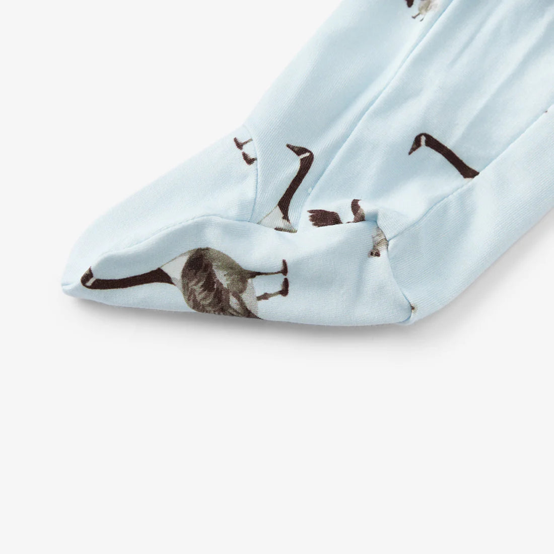 close-up of foot on goose romper