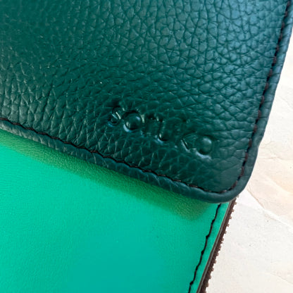 close-up of green eva bag.