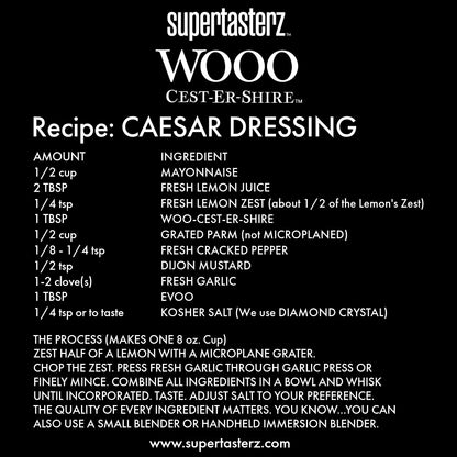 Caesar dressing recipe card from supertasterz on a black background. Call 501-327-2182 for more information.