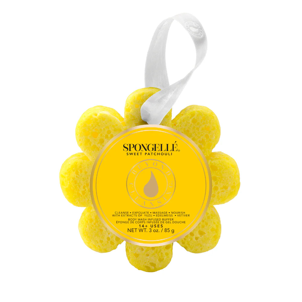 Yellow flower-shaped sponge with a label on a white background