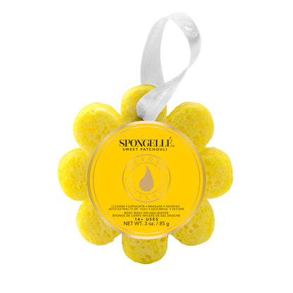 Yellow flower-shaped sponge with a label on a white background